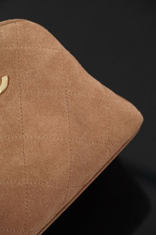 Brown suede Chanel bag with a gold chain
